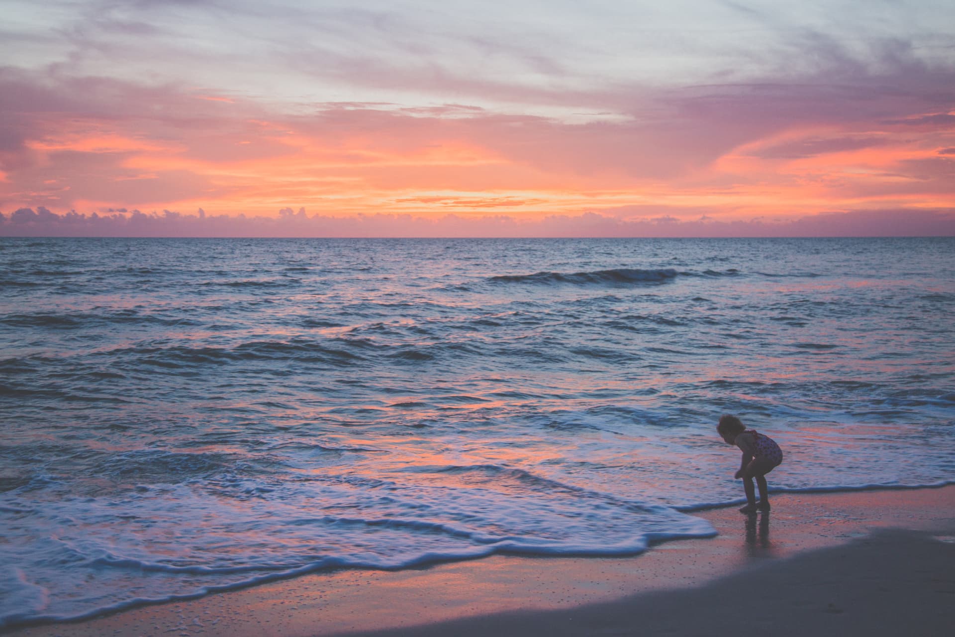 Child at a Naples Gulf sunset